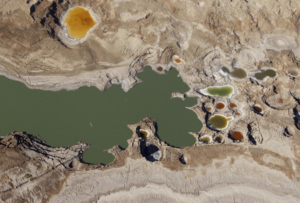 Sink holes filled with water are seen in this aerial view of the Dead Sea